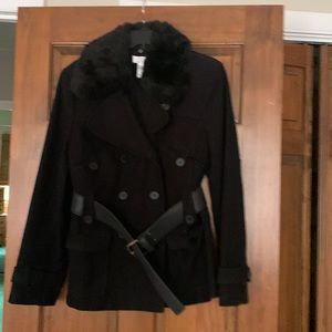 Black wool loft waist length jacket with black leather belt and fur collar